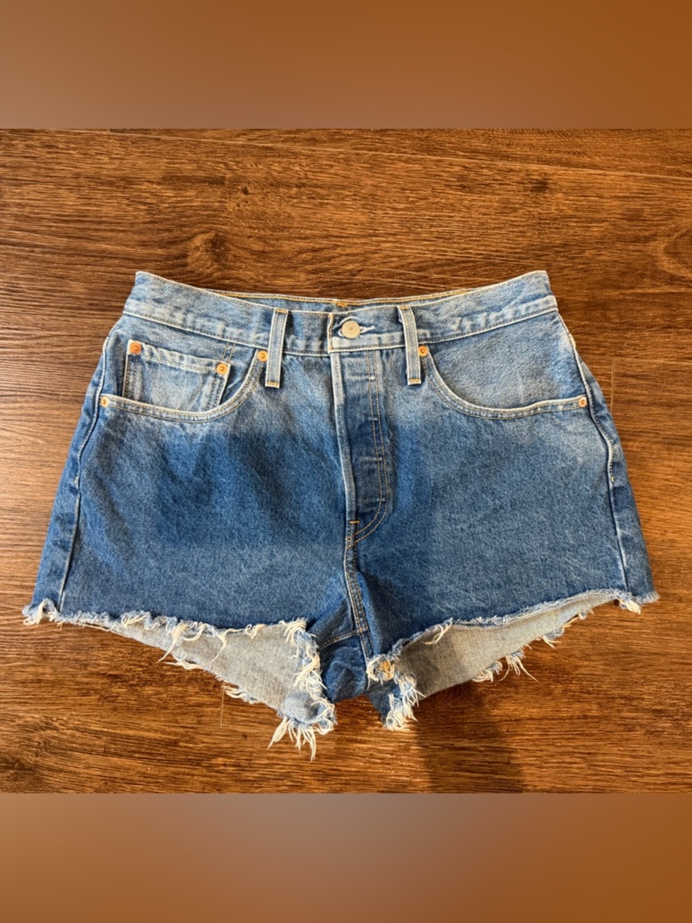 Levi's Medium Blue Frayed Hem Denim Cutoff Shorts